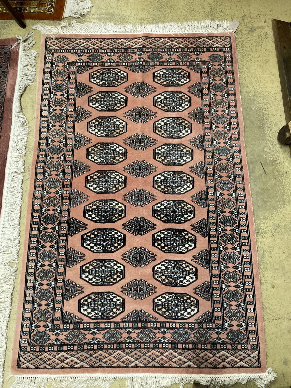 A Bokhara red ground small carpet, a pink ground runner and two other rugs (4), largest 320 x 222cm